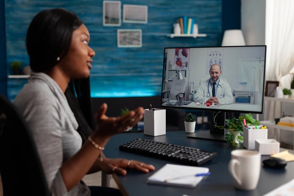 african-american-woman-talking-medic-video-call-receive-medical-advice-about-telemedicine-telehealth-home-young-patient-using-online-remote-conference-talk-physician